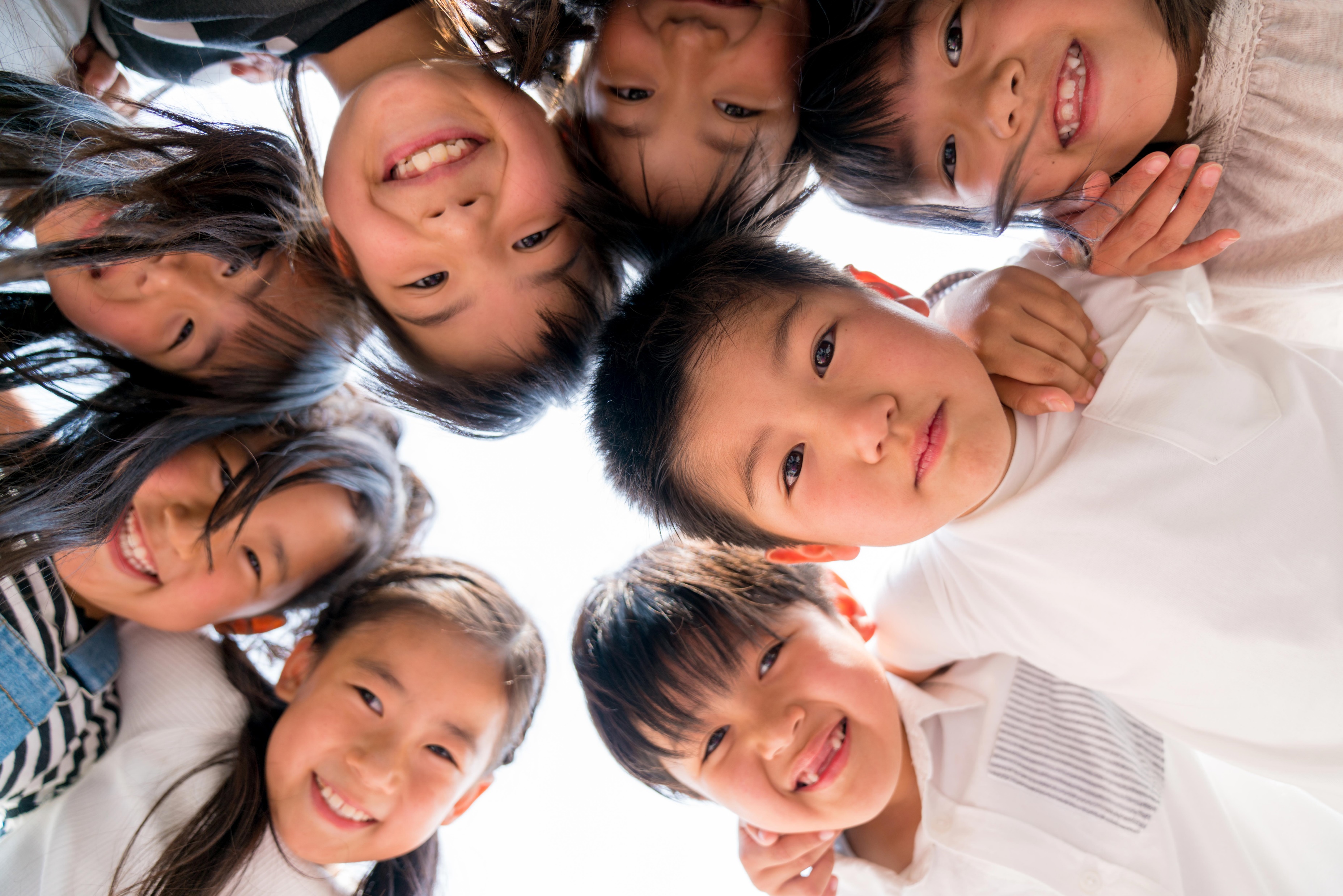 Children gather in a circle